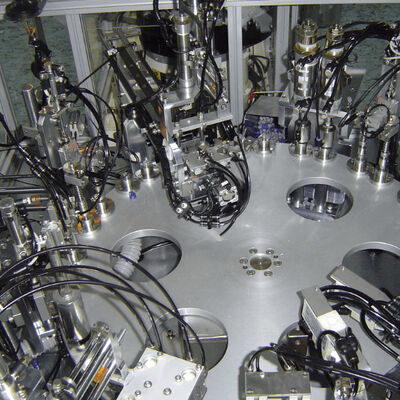 Automatic IV Bag Spike Ports and Injection Ports Assembly Machine with PLC Control System and Stainless Steel Construction for 8000-15000pcs/hr Production